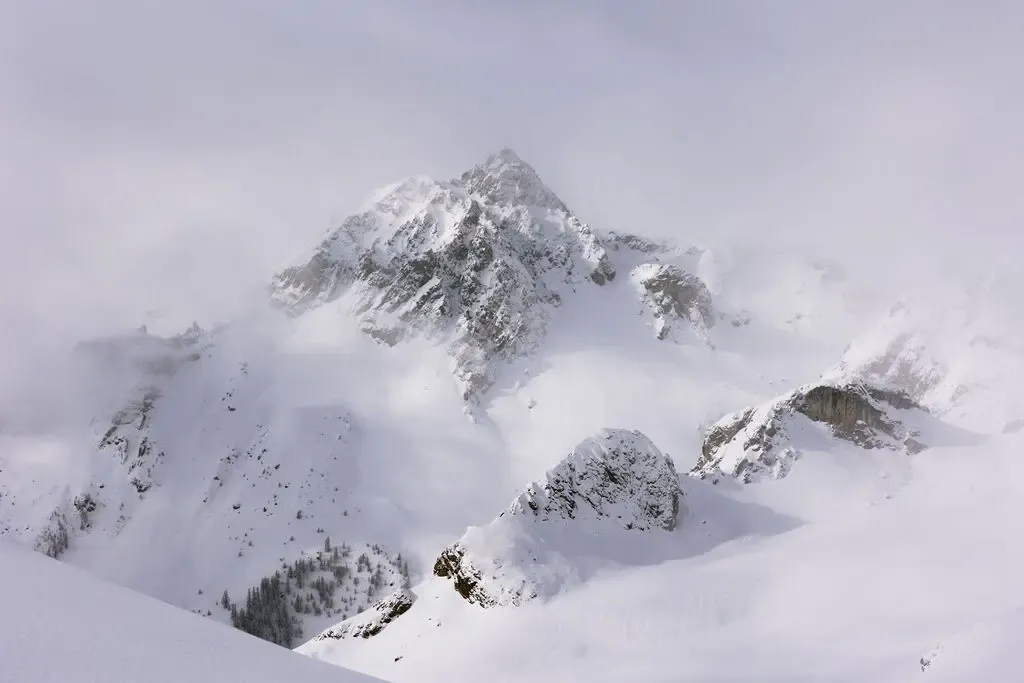 French Alps ski wedding French destination groom with cowboy hat