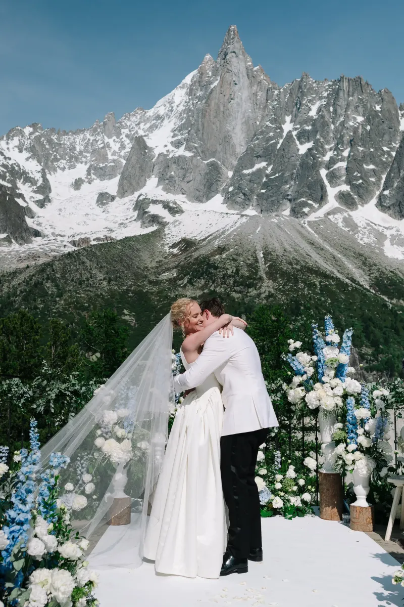 Ceremony bride and groom in Montenvers Mer de Glace with Drus mountain peak view in Chamonix French Alps